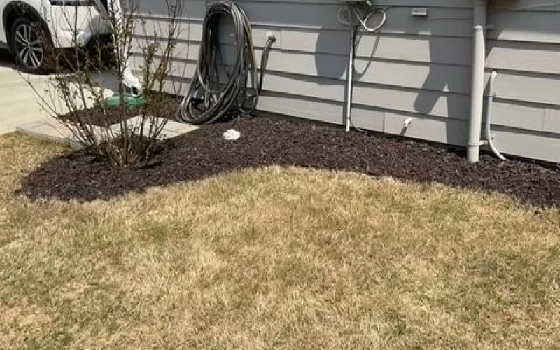Brown Rubber Mulch in Utility Area