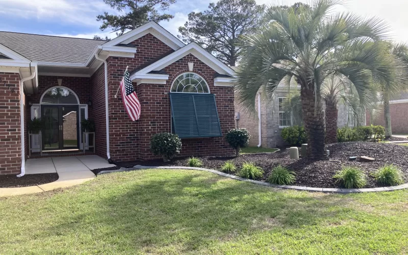 Rubber mulch in front garden bed