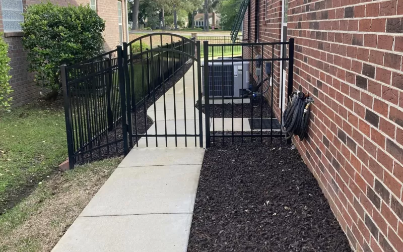 Rubber mulch in side yard next to house