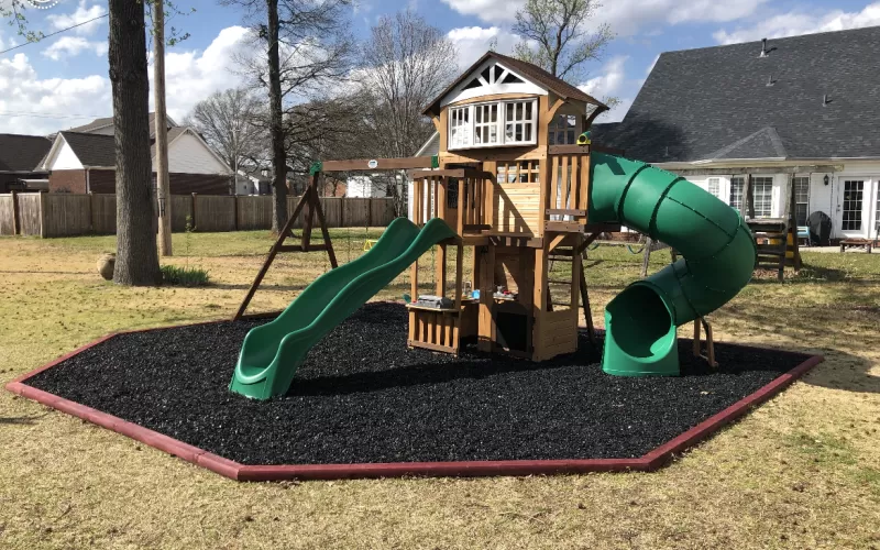 Playground with rubber mulch and hexagon border