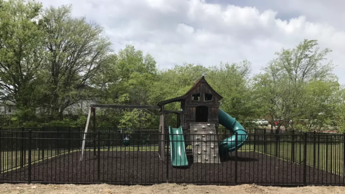 Church playground with rubber mulch surfacing