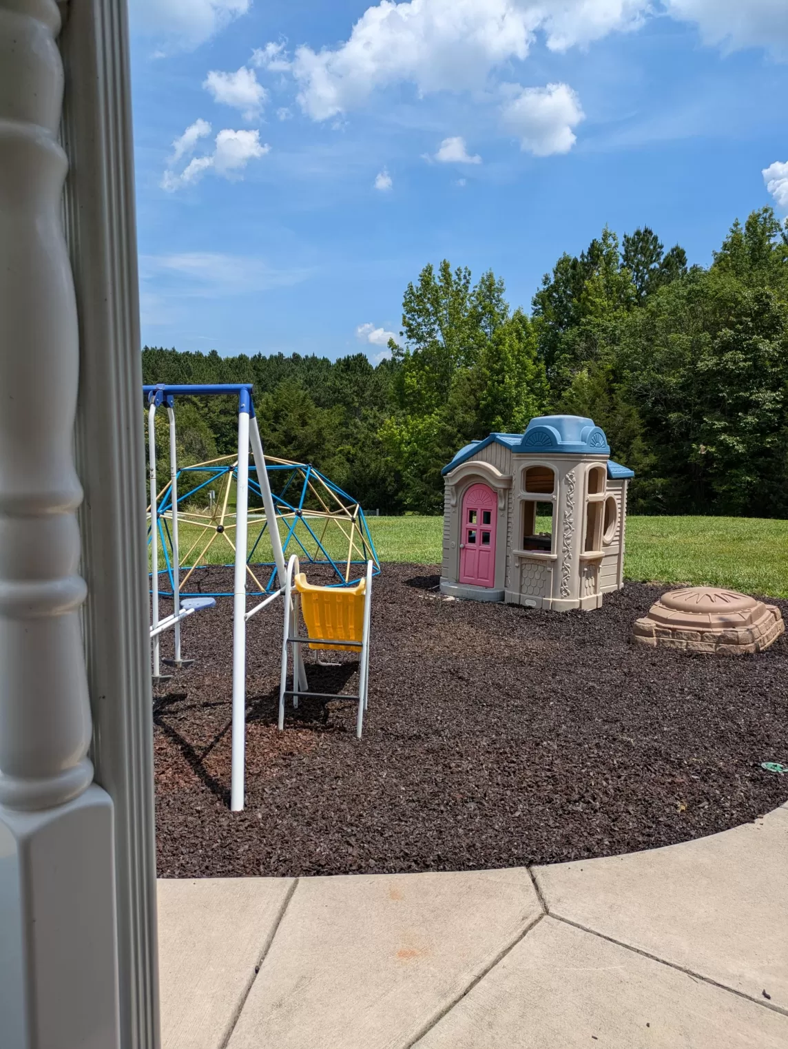 Playground with brown rubber mulch surfacing