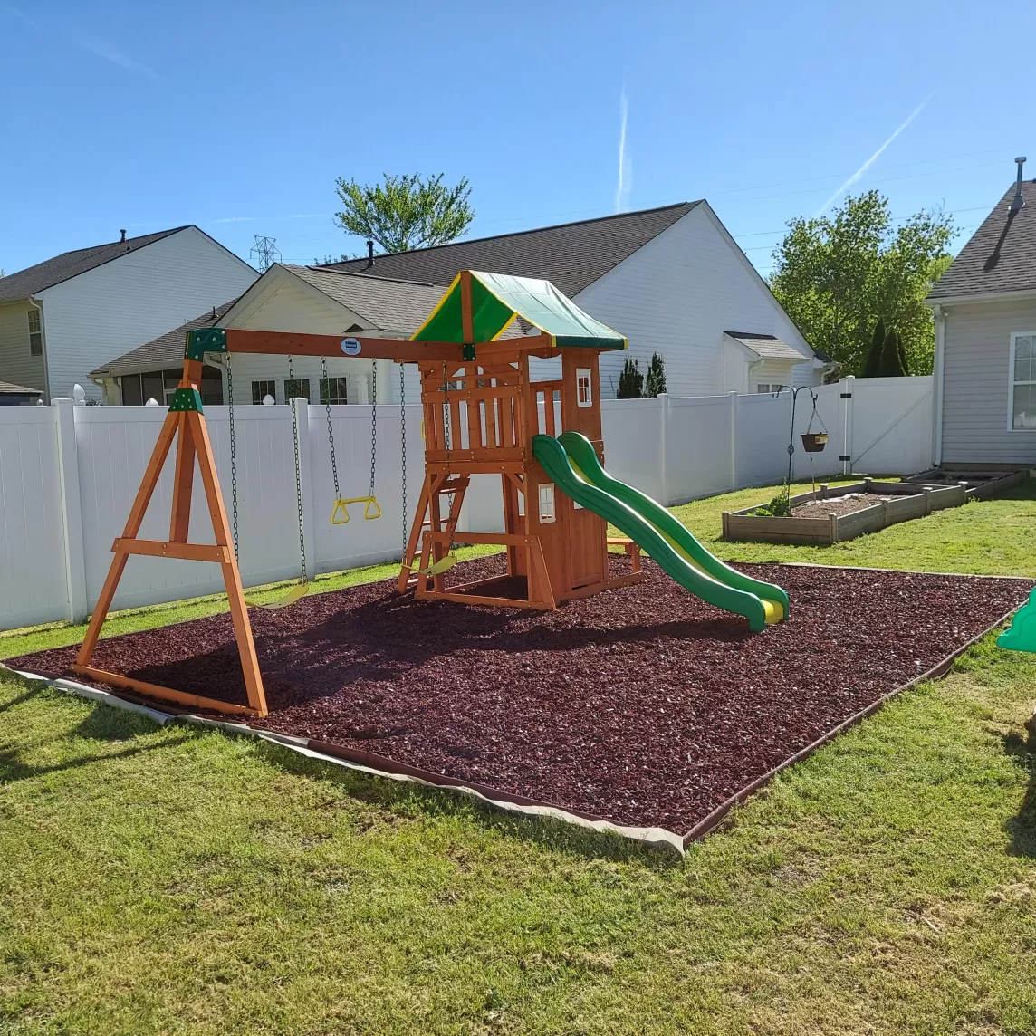 Playground with red rubber mulch