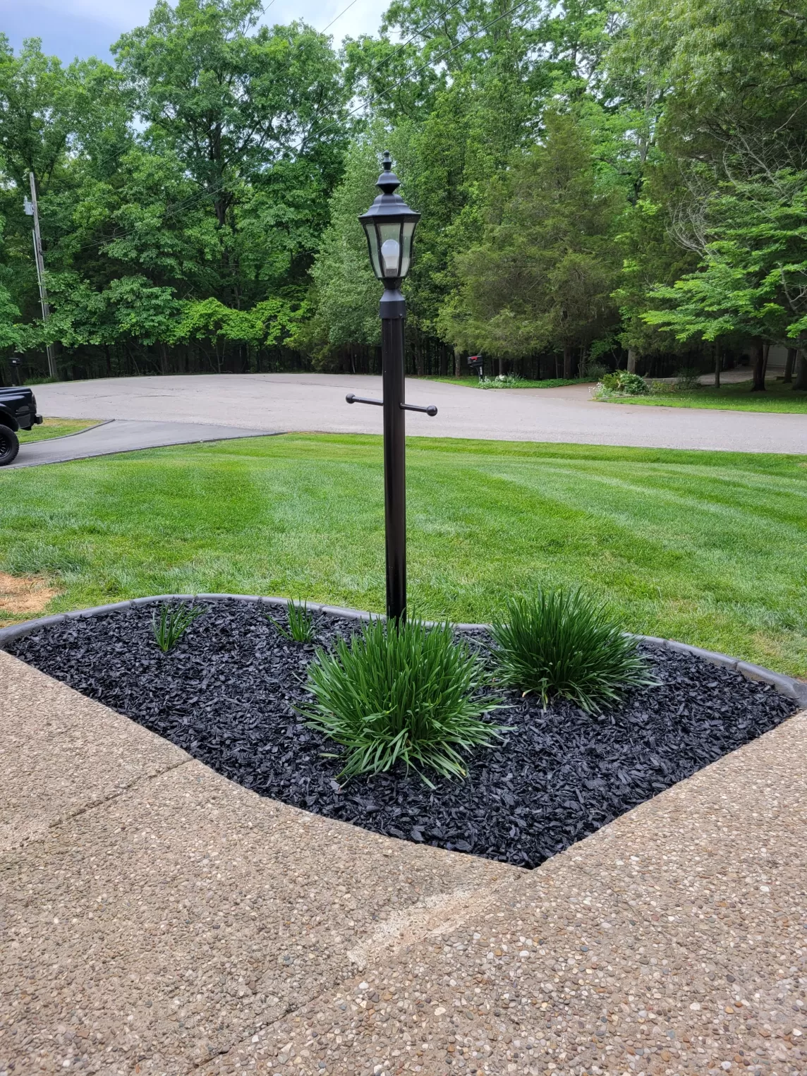 Black Rubber Mulch Landscape Bed