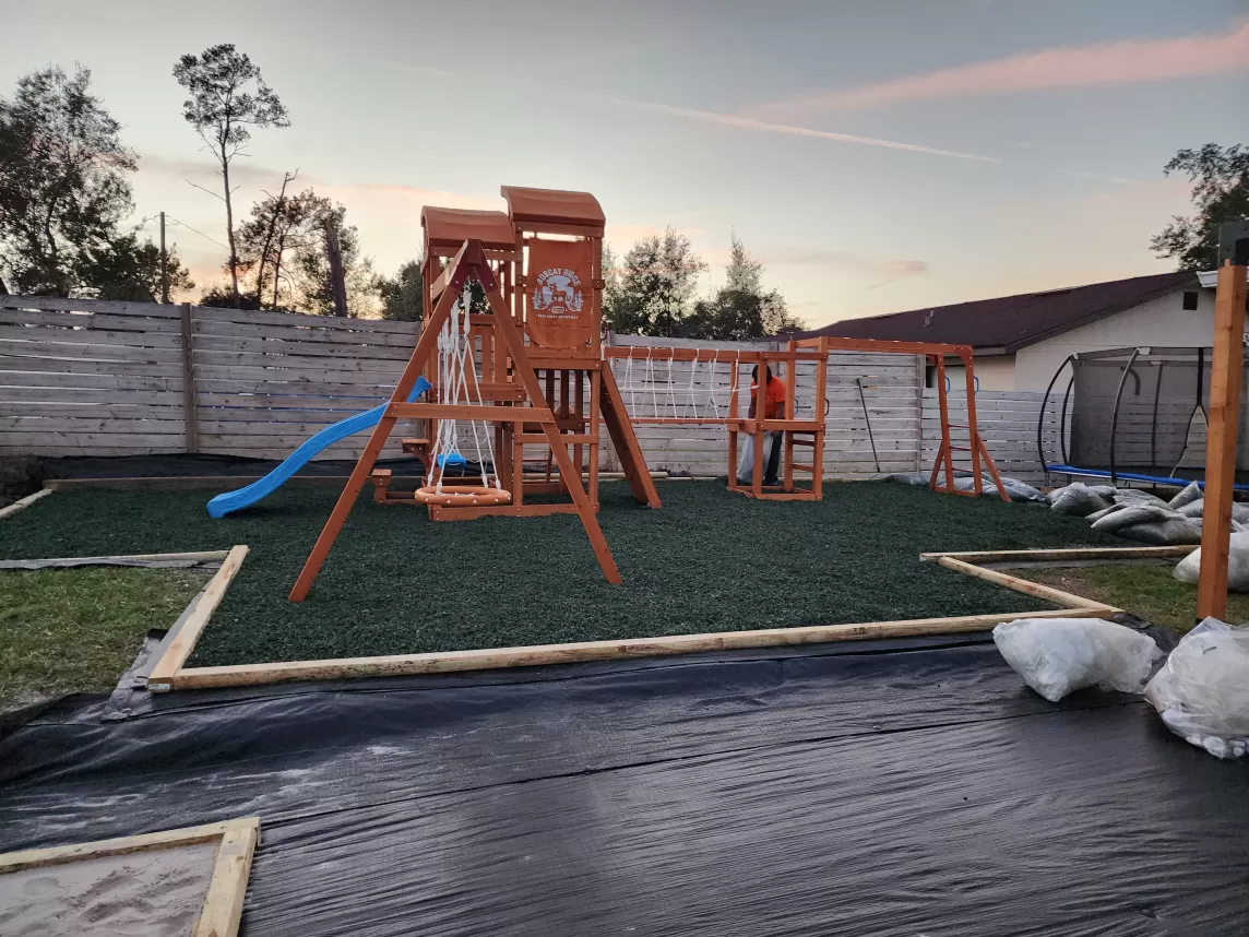 Backyard Oasis Playground with Green Rubber Mulch