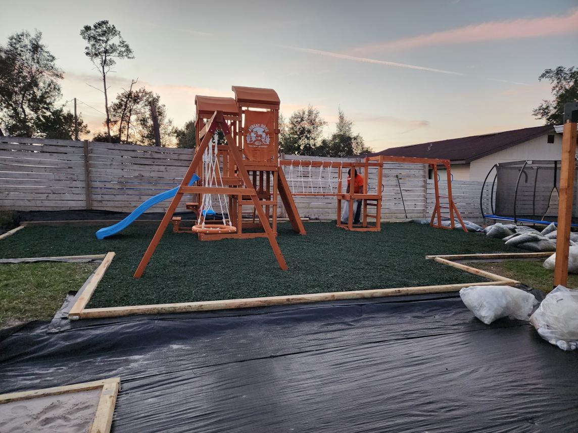 Backyard Oasis Playground with Green Rubber Mulch