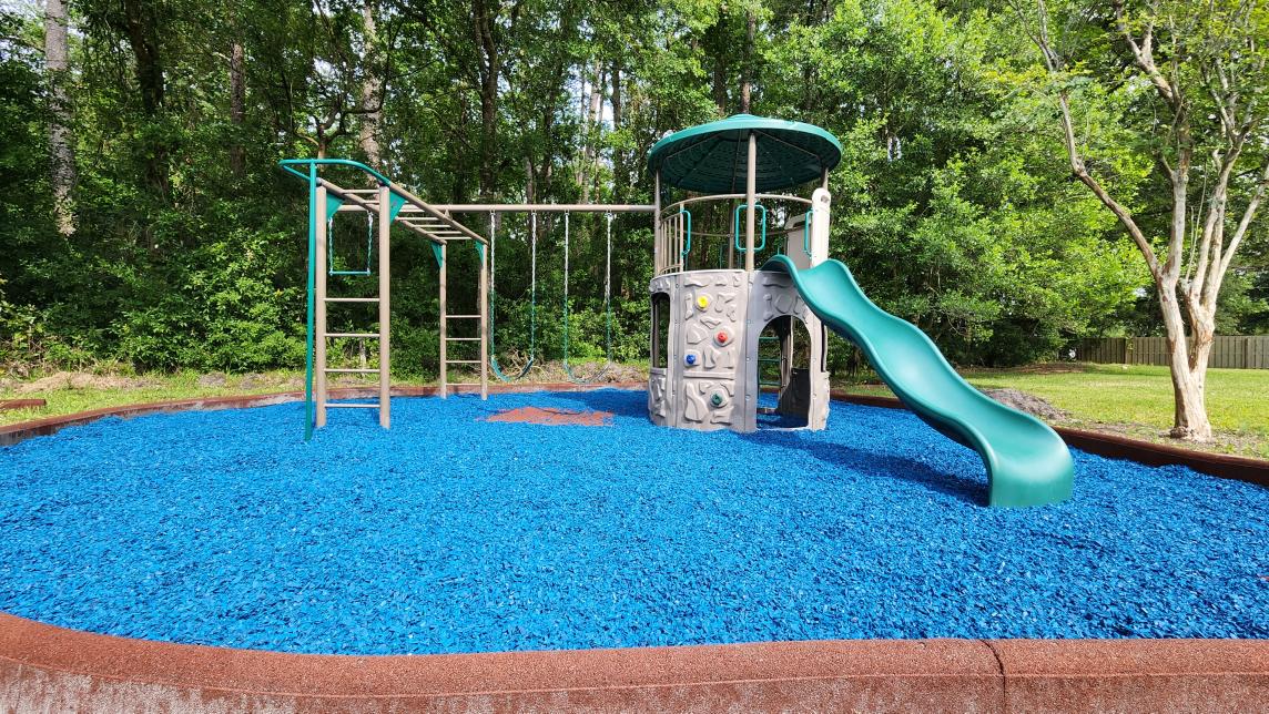 Playground with blue rubber mulch Playground with blue rubber mulch