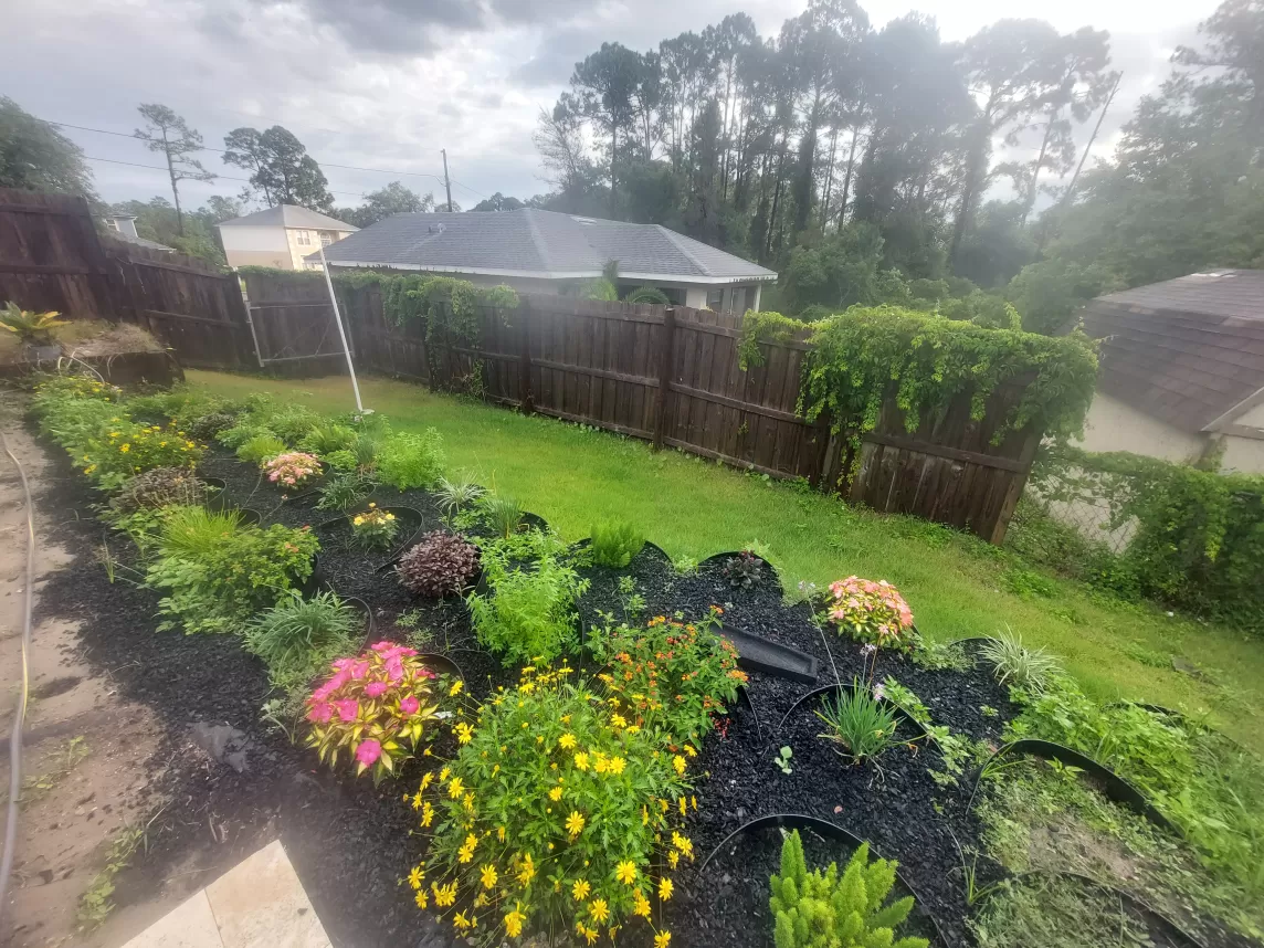 Rubber mulch landscaping on a slope