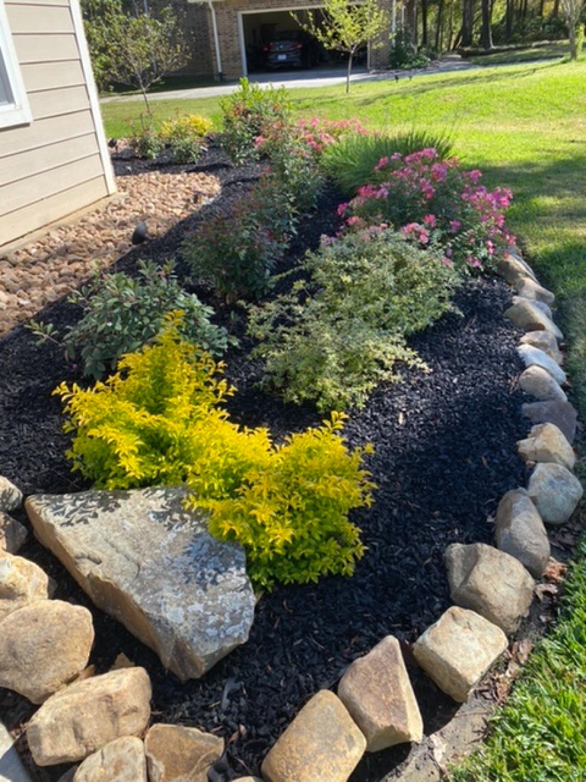 Rubber Mulch Landscaping with Stone Border Zone