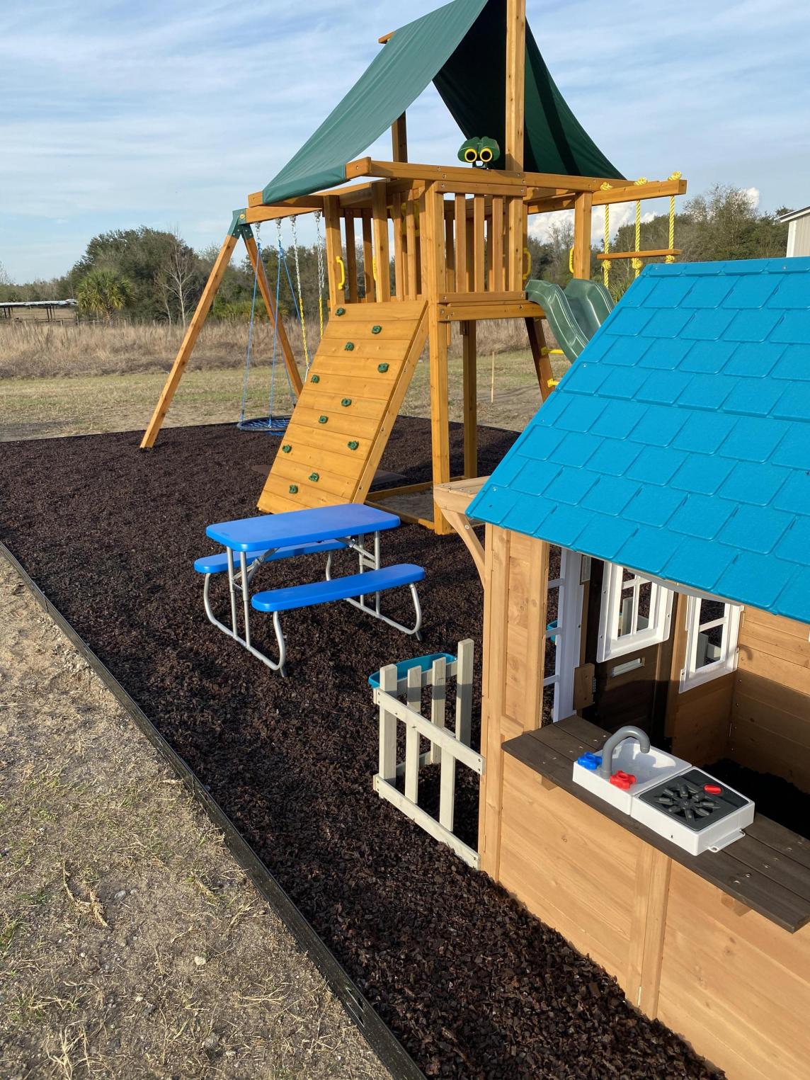 Home playground with rubber mulch