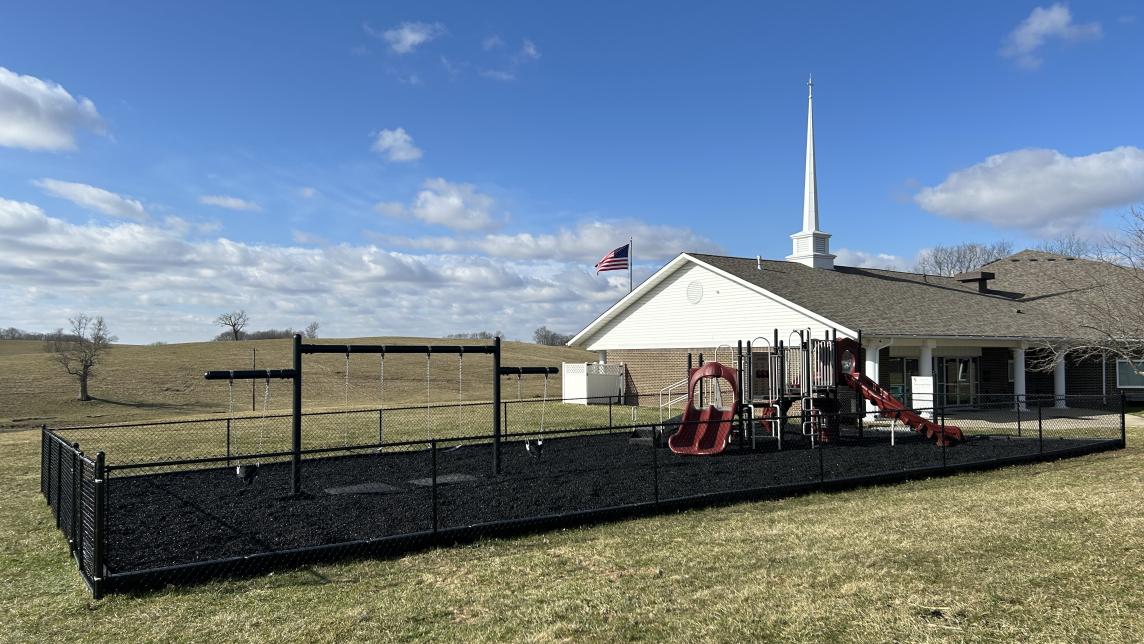 Church Playground with Black Rubber Mulch Black rubber mulch ground cover used in church playground