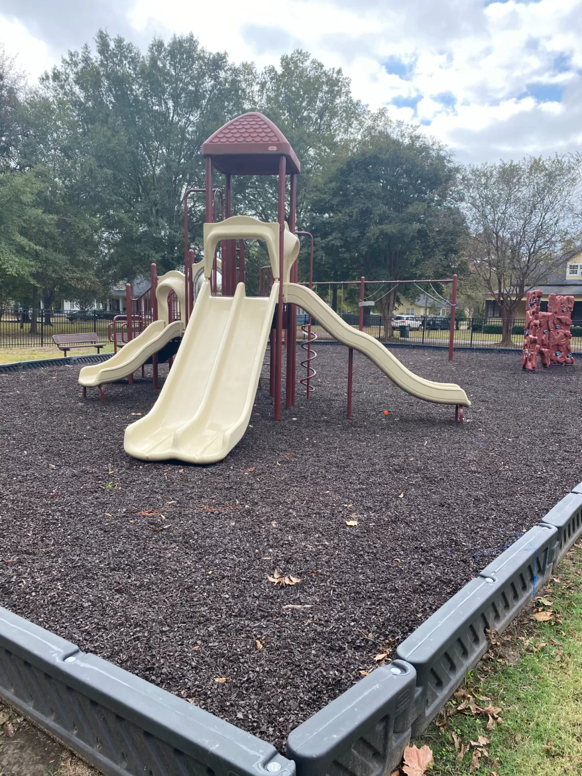 Church Playground With Brown Rubber Mulch Corner View