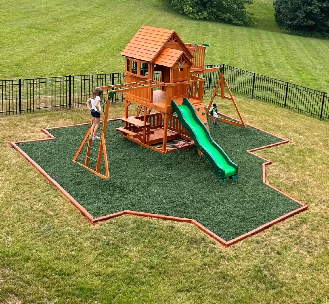 Playground with Green Rubber Mulch Ground Covering