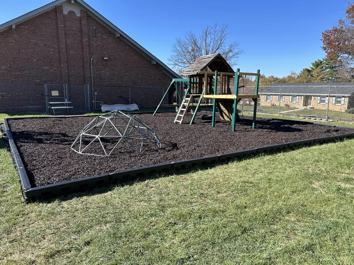 Brown Rubber Mulch Ground Surfacing on a Playground