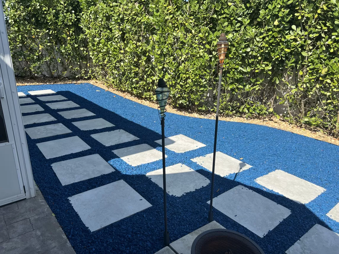 Large Pavers with Blue Rubber Mulch in Between