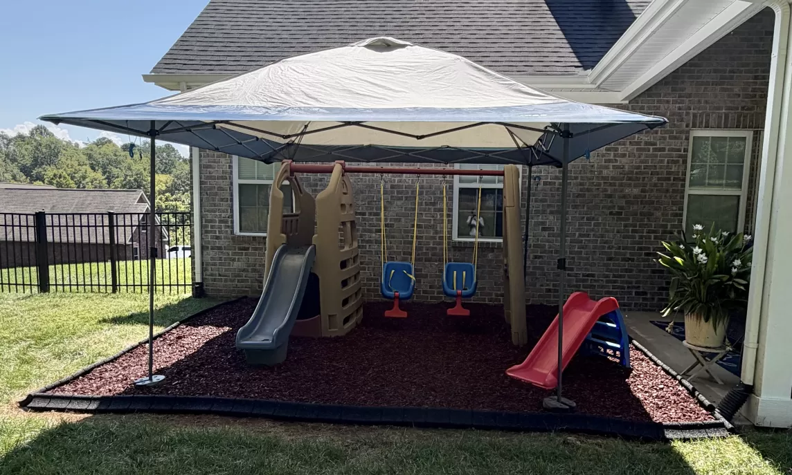 Red Rubber Mulch Replaces Grass Ground Covering