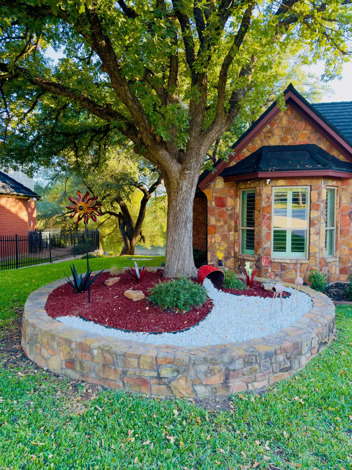 Red Landscape Rubber Mulch in Front Yard