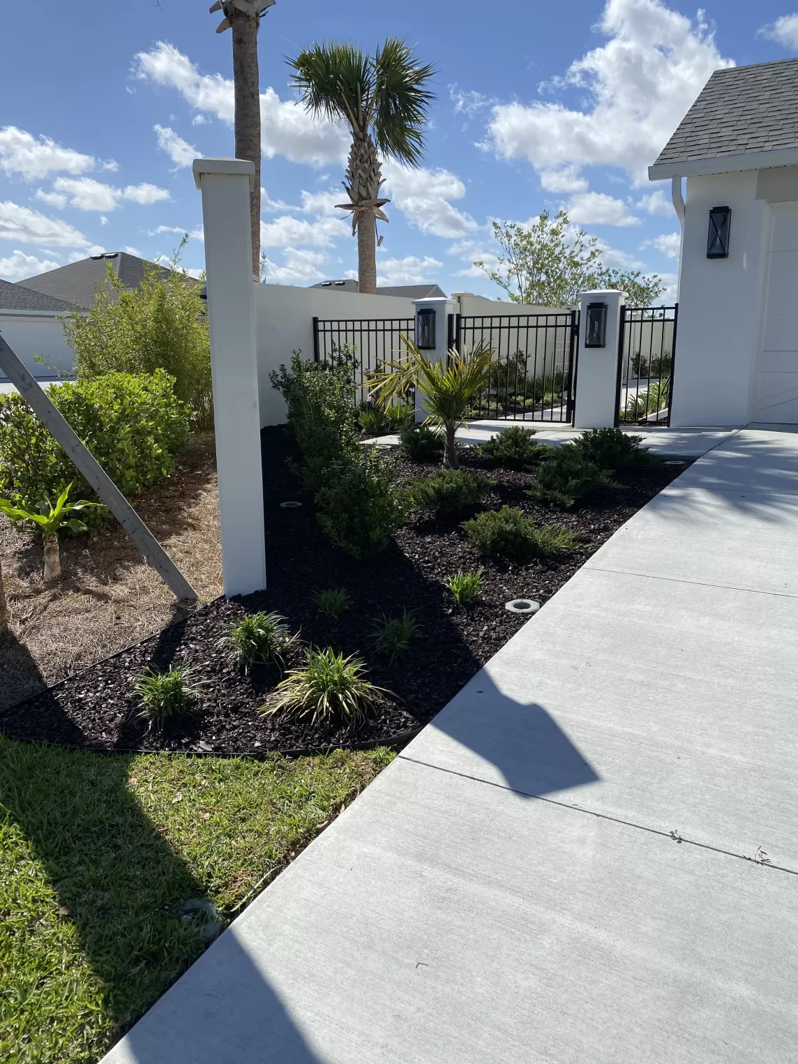 Brown rubber mulch landscape refresh