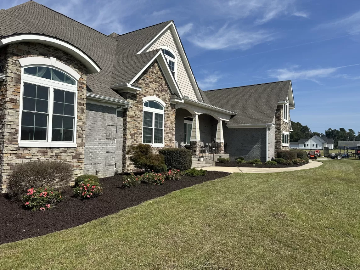 Large landscaping project with brown rubber mulch