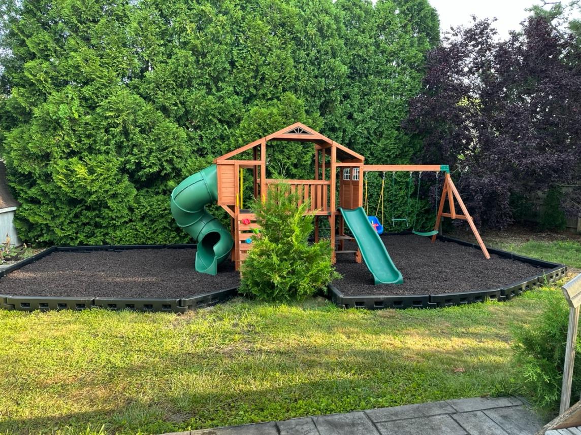 Playground with Brown Rubber Mulch and DuraTimber Borders