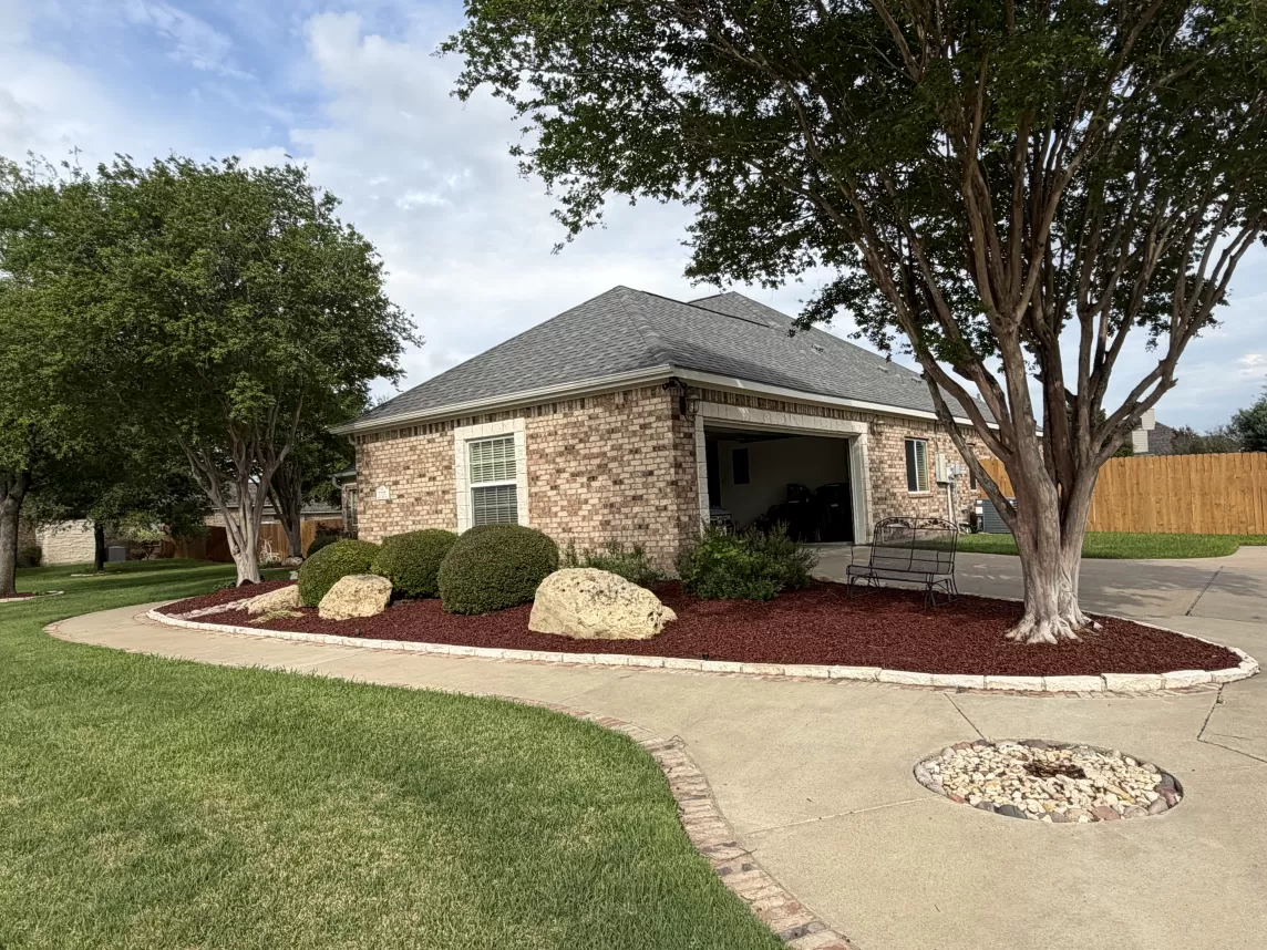 Red Rubber Mulch Landscaping in Front Yard