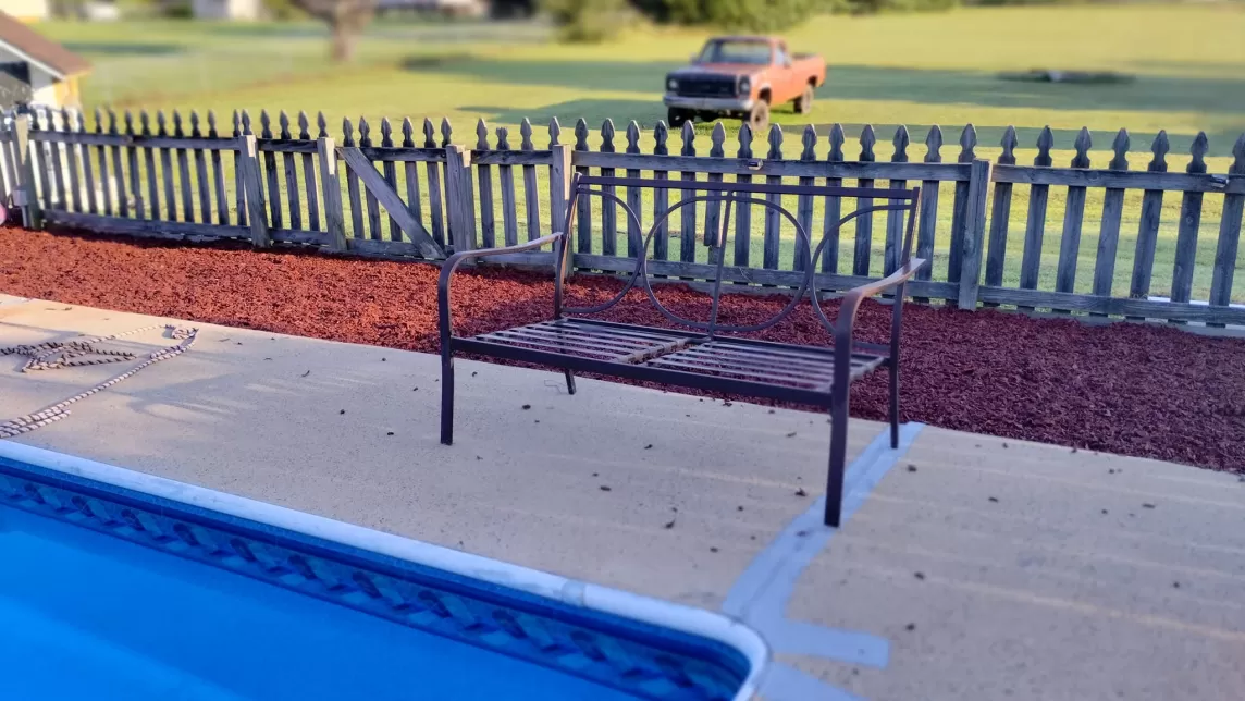 Pool with Red Rubber Mulch Surrounding