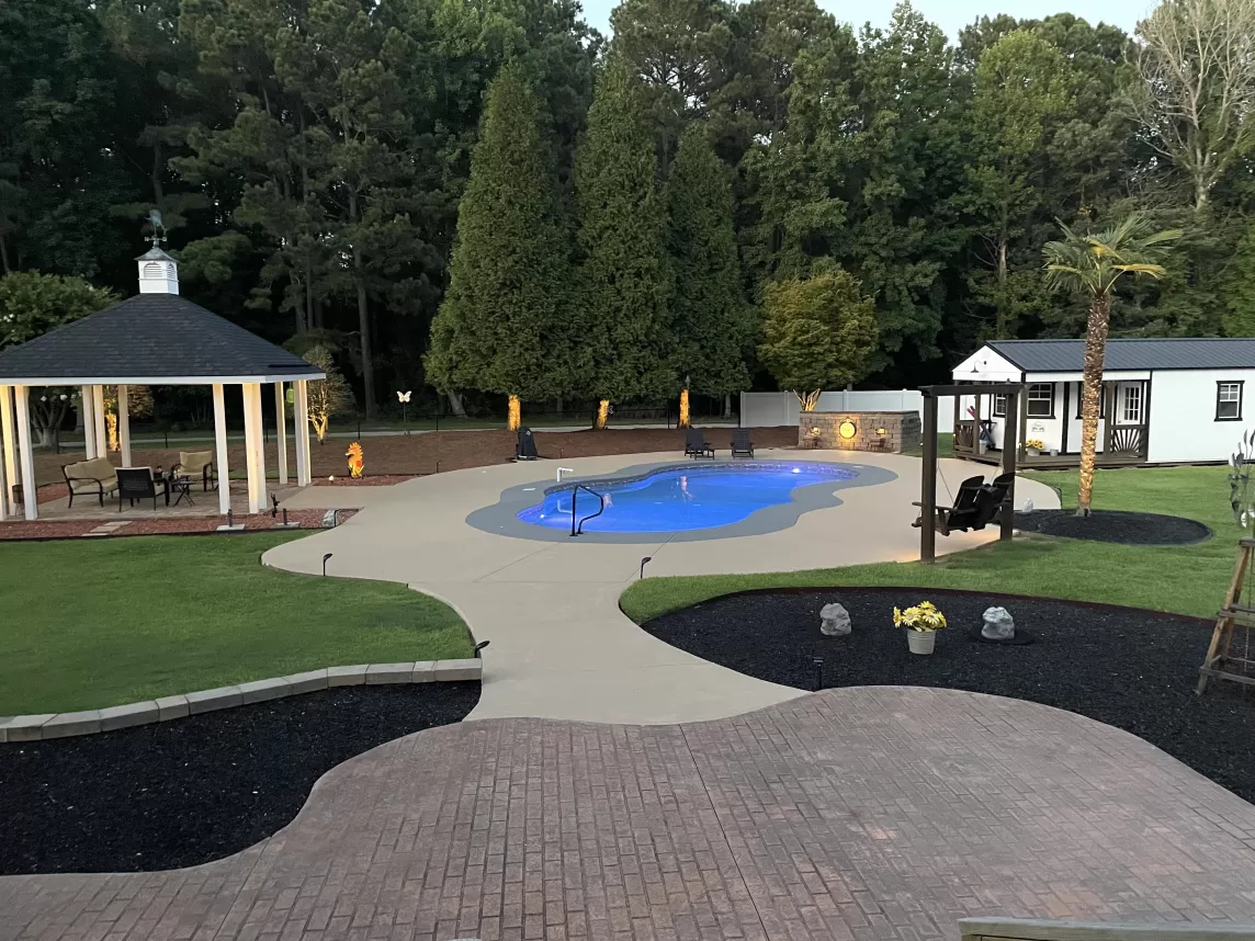 Black Rubber Mulch Pool Landscaping After Photo