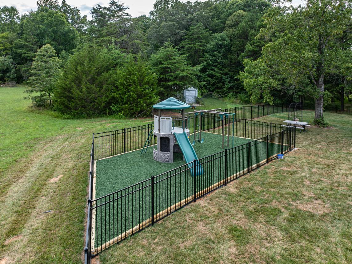 Play area with green rubber mulch surfacing