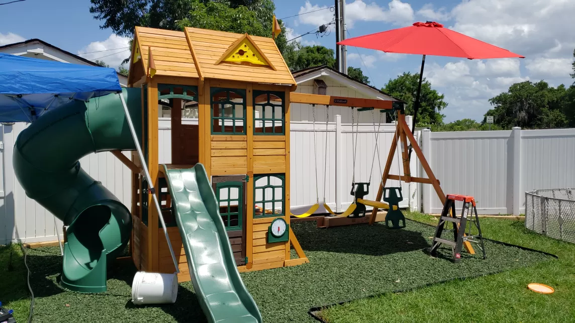 Playground with green rubber mulch 