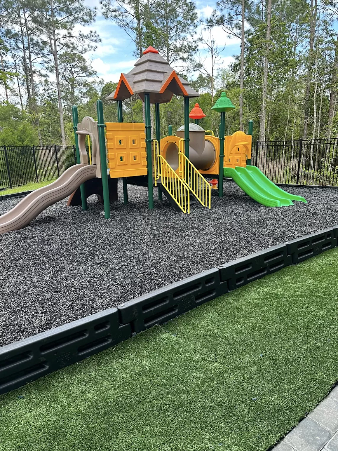 Playground with natural rubber mulch