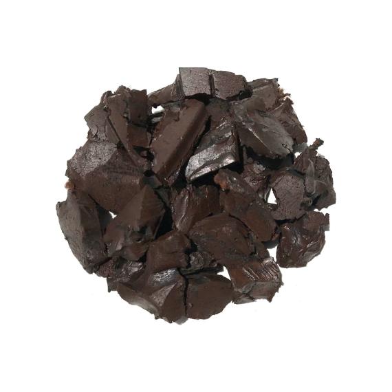 Brown rubber mulch solid in bulk for landscaping, playgrounds, and other applications.